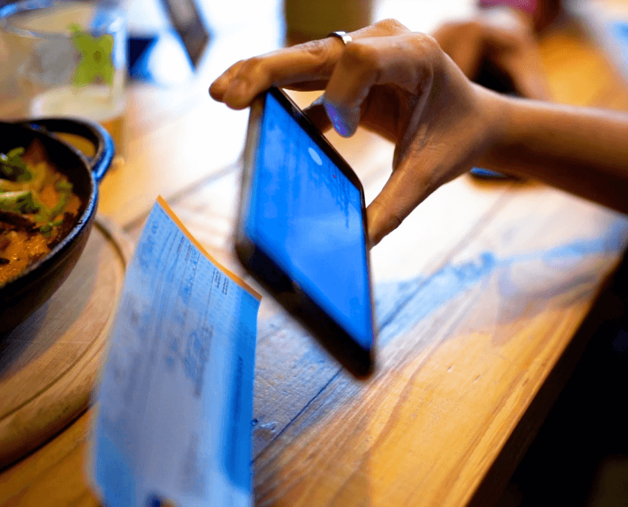 Person making contactless payment