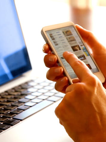 Person making purchase on mobile phone