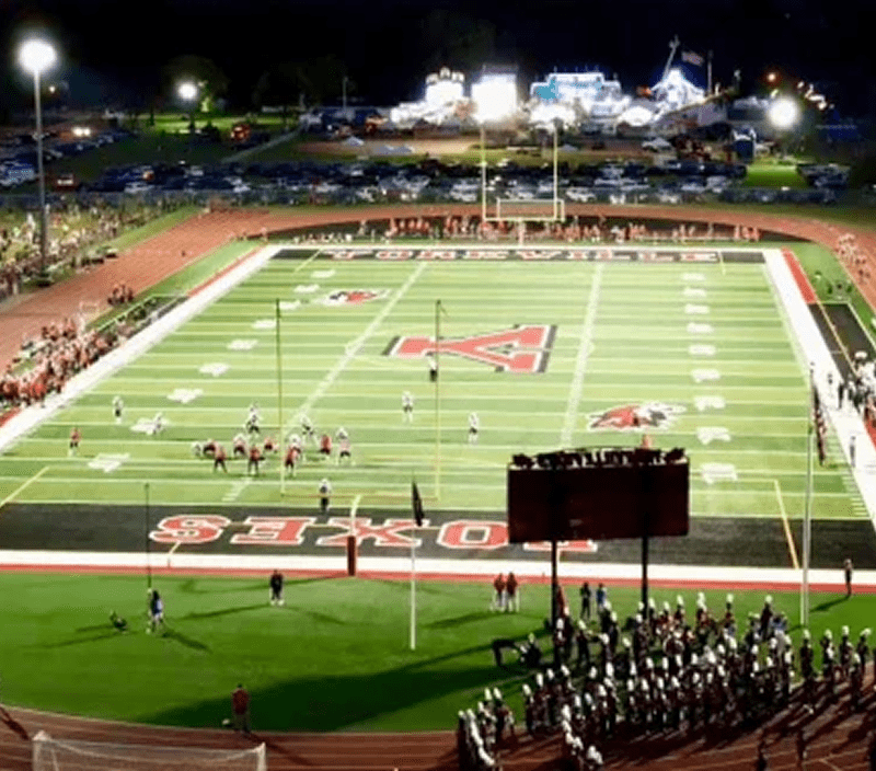 An aerial view of a football game taking place at a stadium in Yorkville, Illinois.
