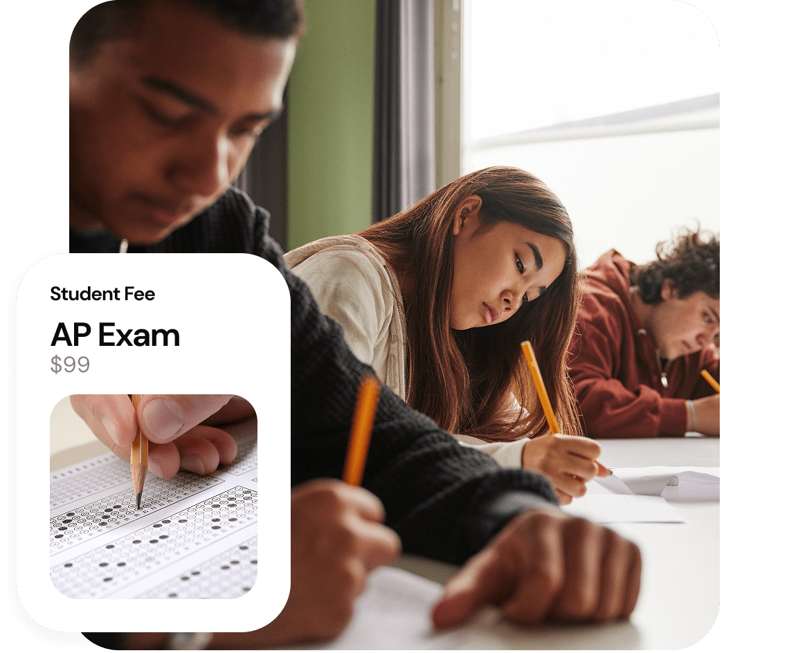 Several students taking a multiple-choice AP exam in a classroom.