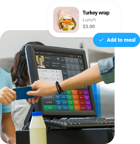 A student and a cafeteria staff member exchanging a payment card at a touchscreen POS with an “Add to meal” button overlay.  