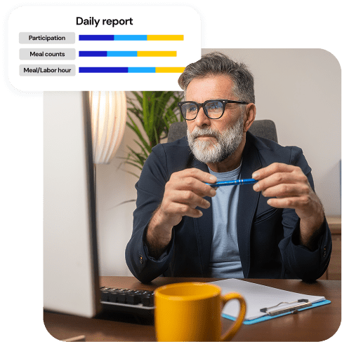 A school administrator reviewing performance data with a “Daily report” overlay showing key metrics.