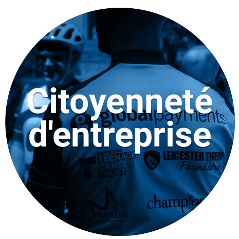 Man with back to camera wearing shirt with different logos (blue overlay)