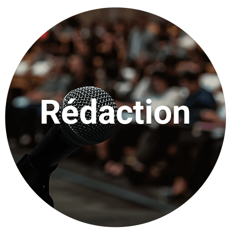 Photo of microphone with crowd in background